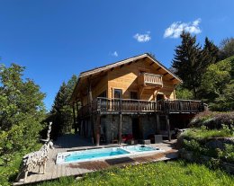 Grand chalet de prestige 24 personnes avec piscine et jacuzzi, face aux pistes à Vars