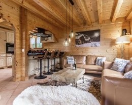 Vivez une expérience unique au Grand Massif : charme, confort, jacuzzi, sauna, et les pistes à portée de main vous attendent !