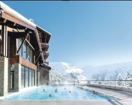 Appartement de charme en résidence 5* skis aux pieds avec piscine, jaccuzi, sauna, et hammam 