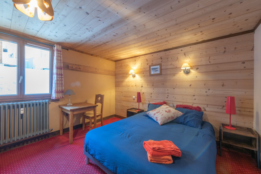 Room 2: one large 160cm bed and a bathroom with shower, sink and toilet.