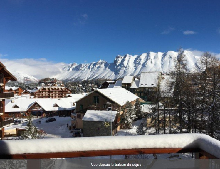 VIEW FROM THE BALCONY OF THE LIVING ROOM ON THE RESORT OF JOUE DU LOUP AND THE DEVOLUY MOUNTAINS