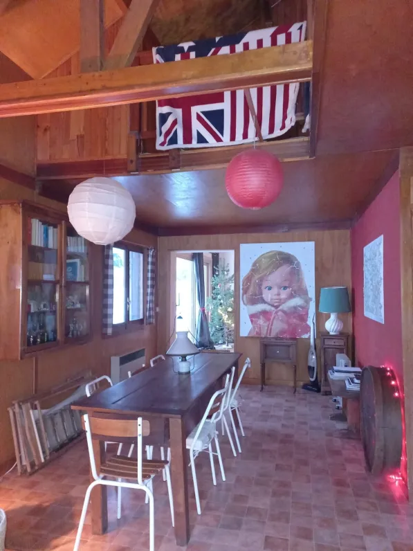 Another view of the dining room with an opendoor to the large living room