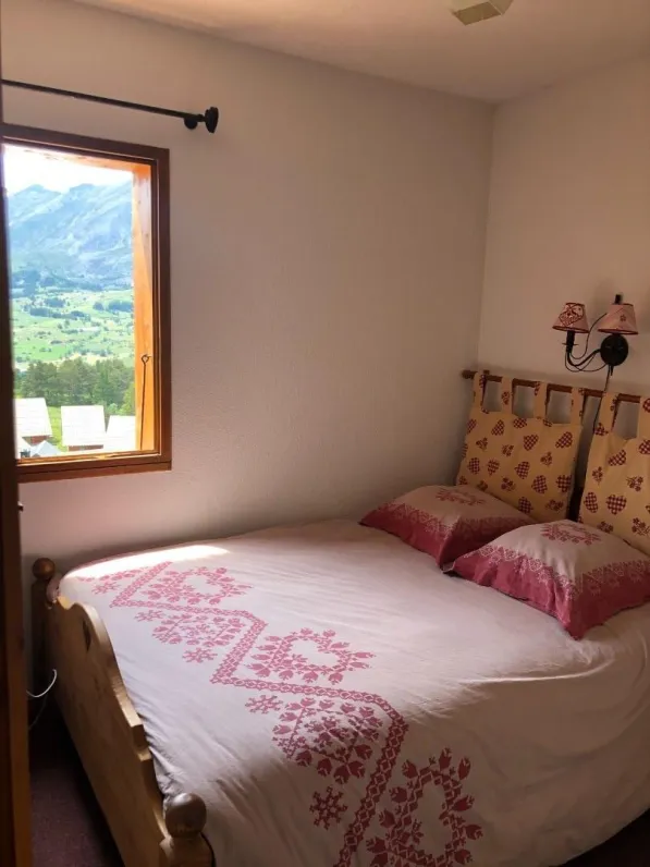 bedroom with queensize bed and dressing