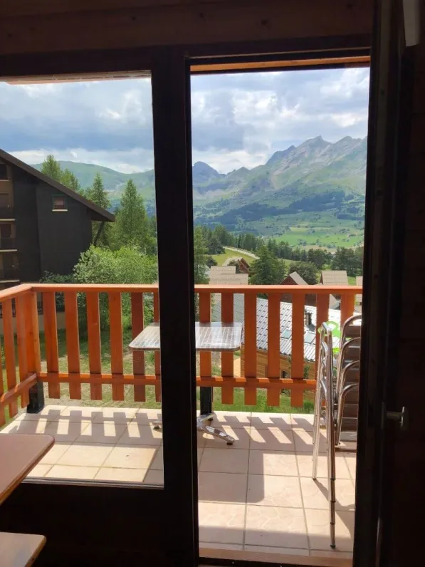 balcony with table and 4 chairs