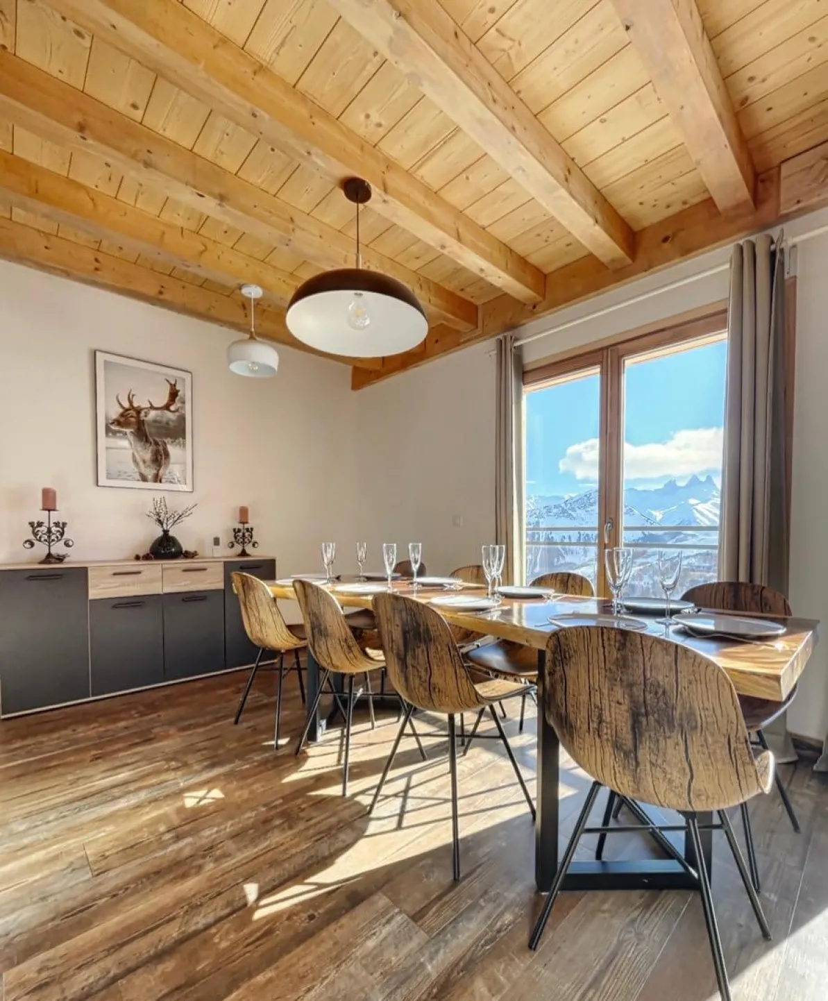 Dining room with a large wooden table.