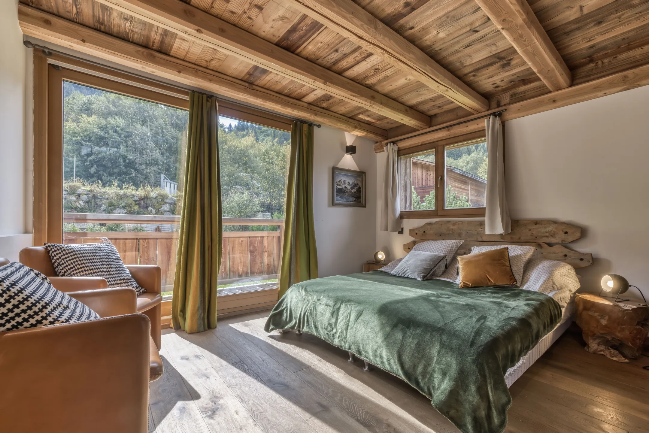 Bedroom 2: Double size bed, next to separate bathroom with stand-alone rain shower, vanity and toilet, mountain view, private balcony
