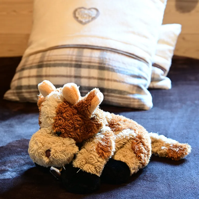 Peluche enfant vache