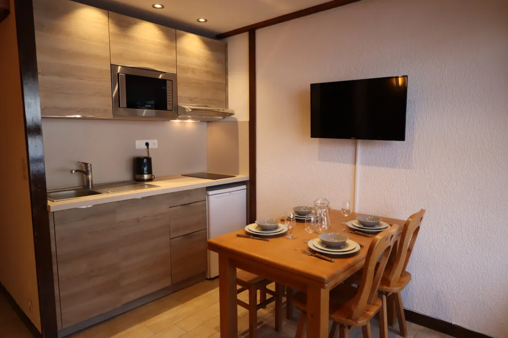 Studio plein centre, pied des pistes, wifi,parking