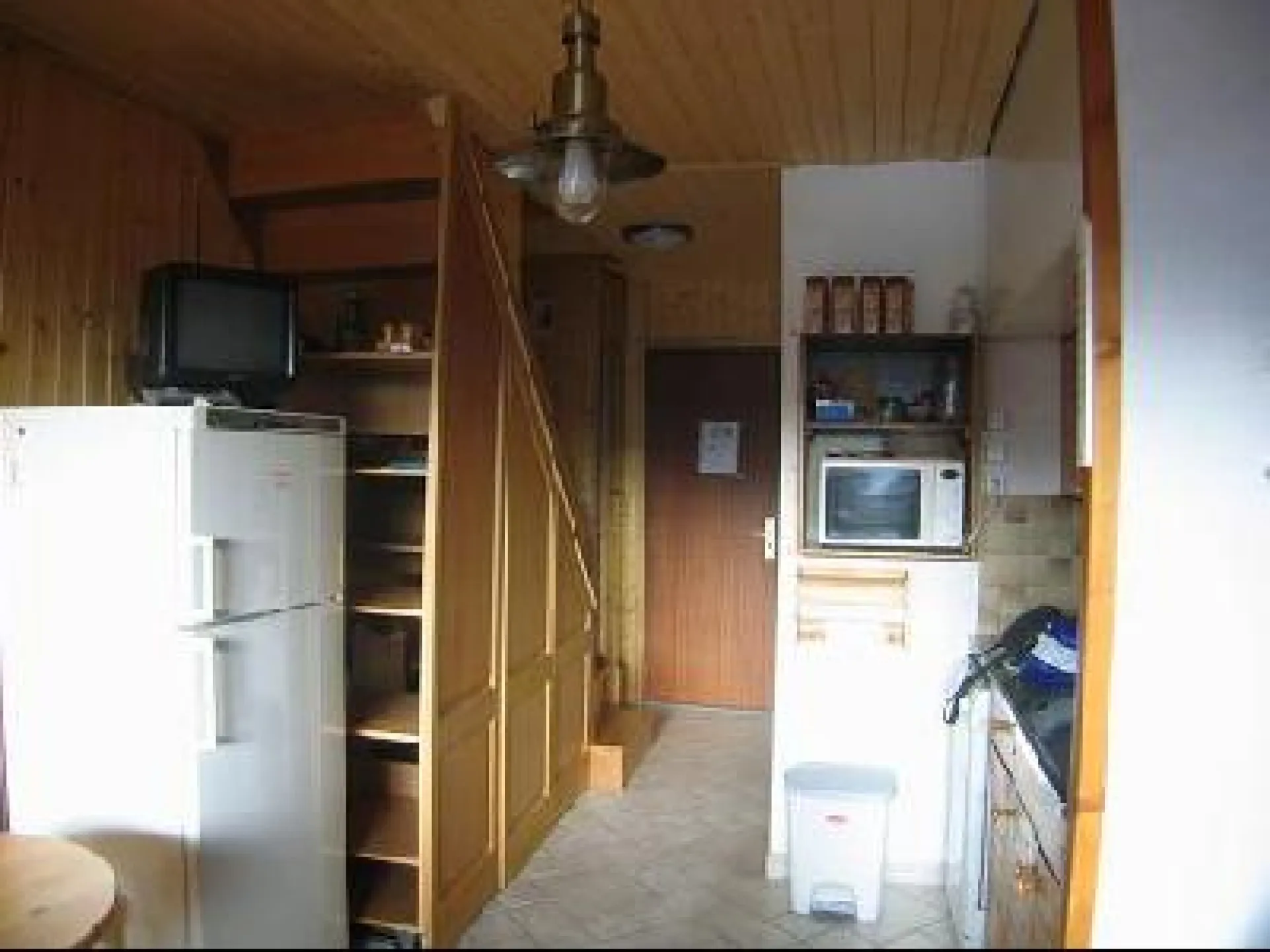 living room with kitchenette - sofa - balcon