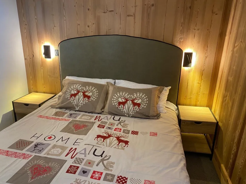 chambre avec 2 lits twins et 2 lits superposés