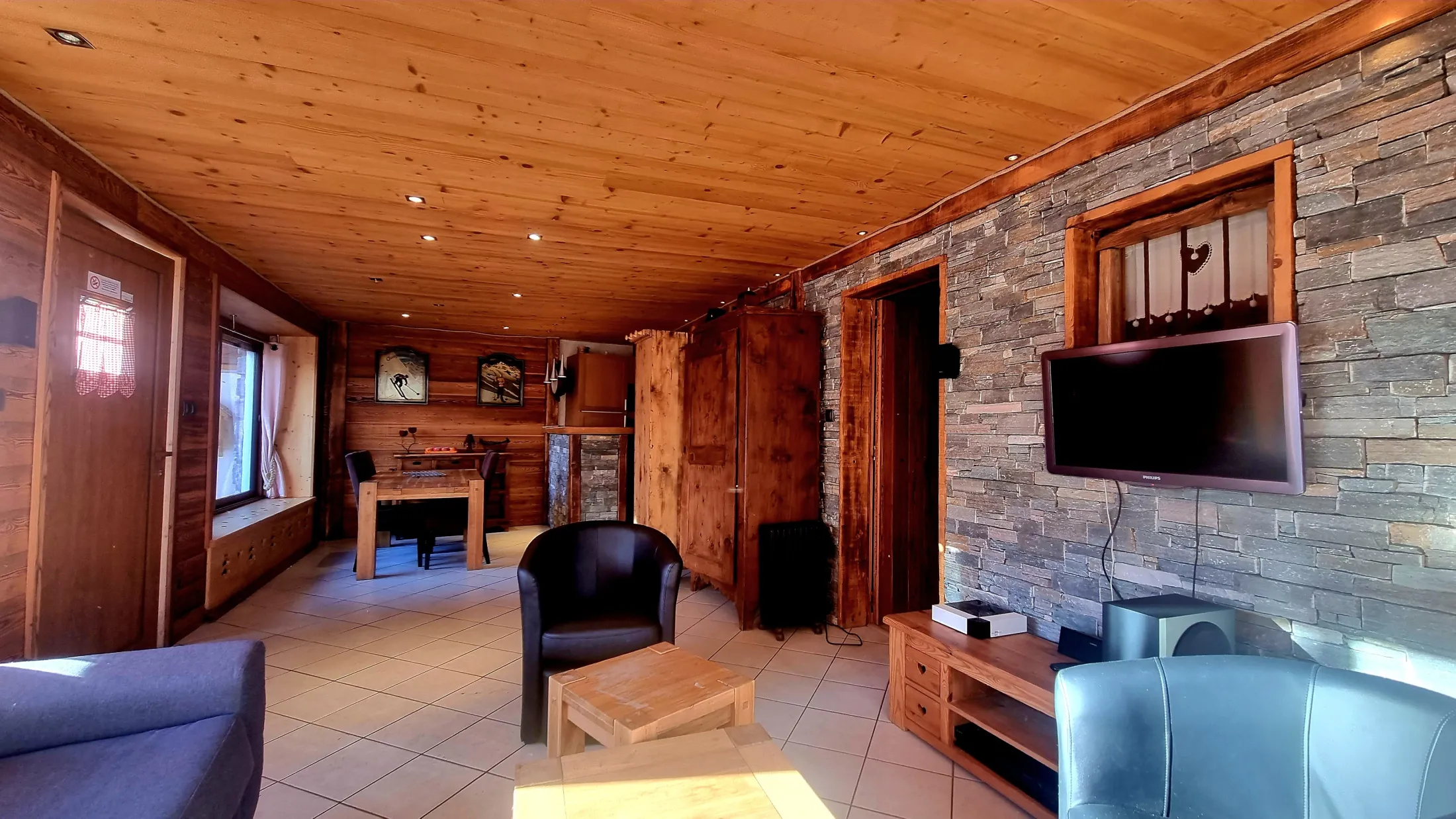 Living room with open-plan kitchen.
