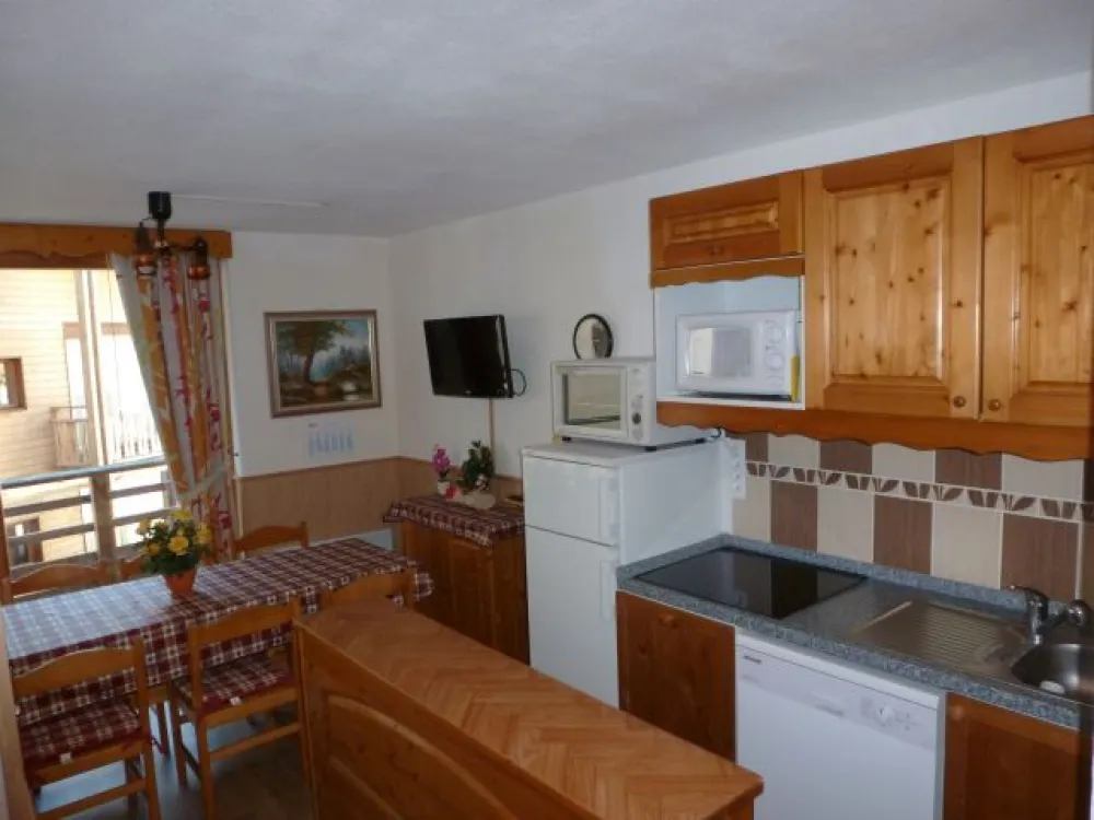 kitchen - living room + balcony access