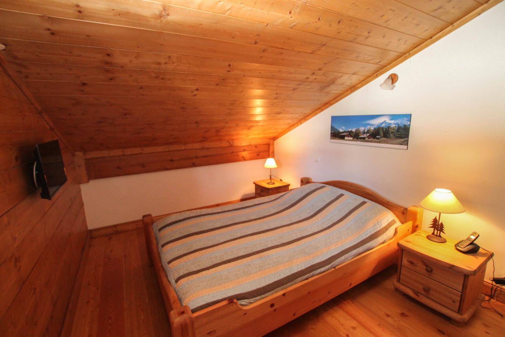 Chambre parentale avec TV