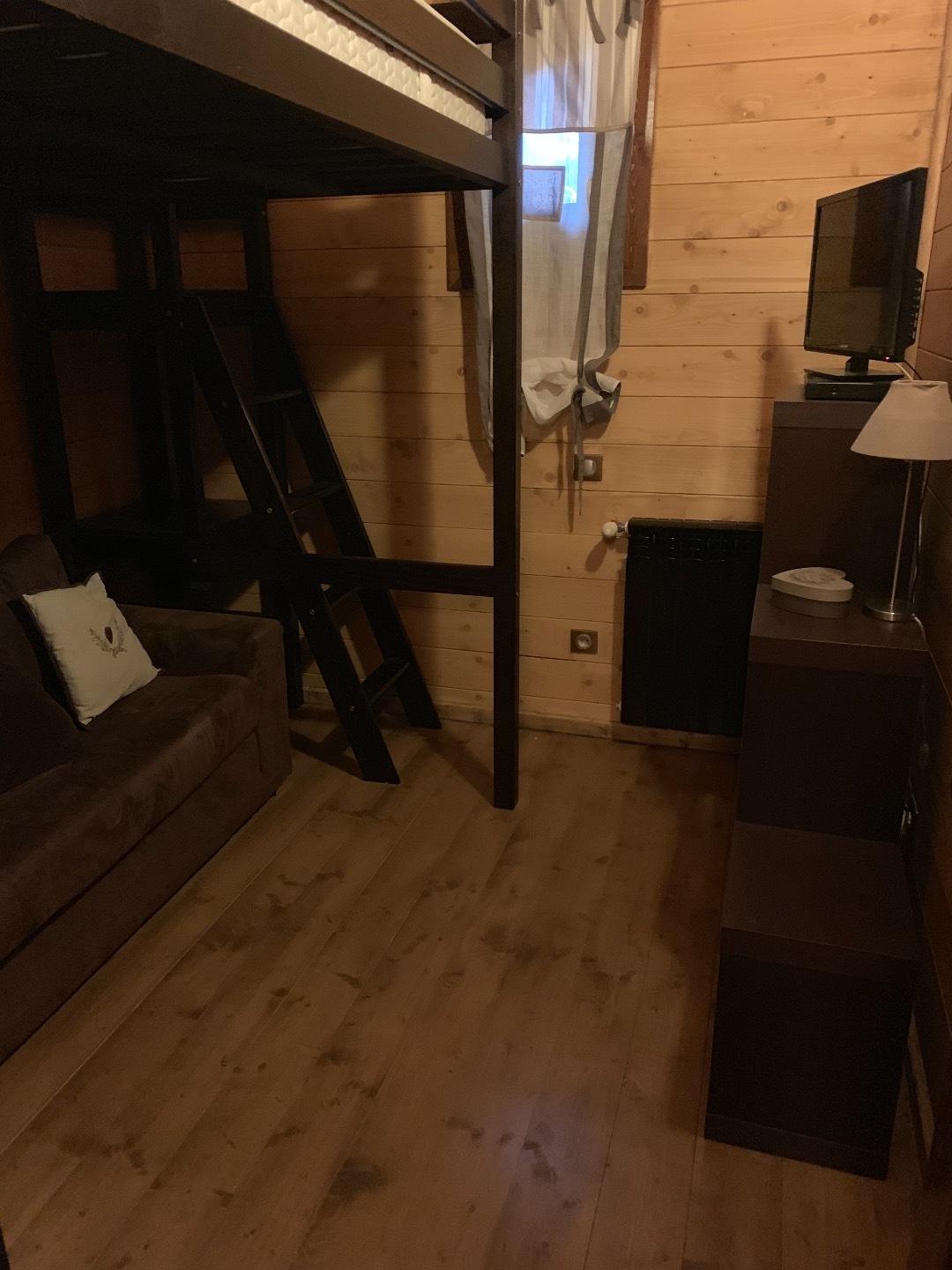 Chambre avec lit mezzanine et canapé convertible 