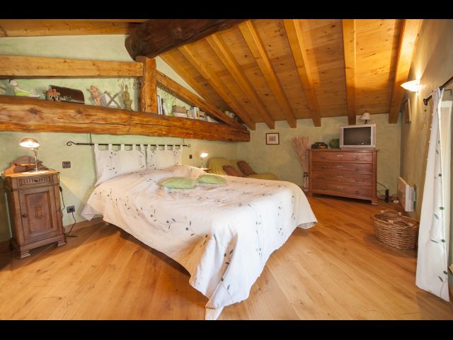 Chambre verte avec lit en 160