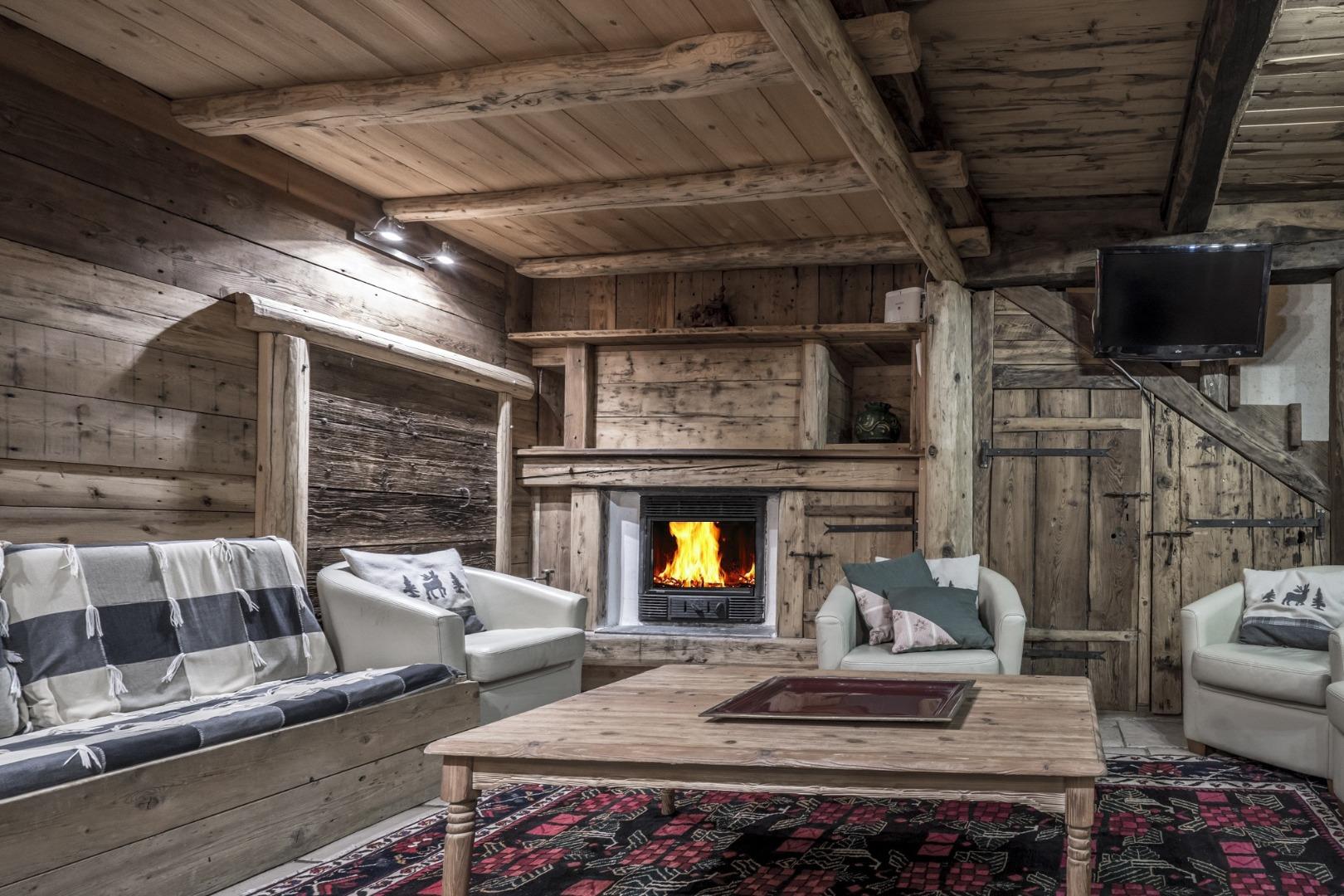 La Laiterie et sa cheminée en bois