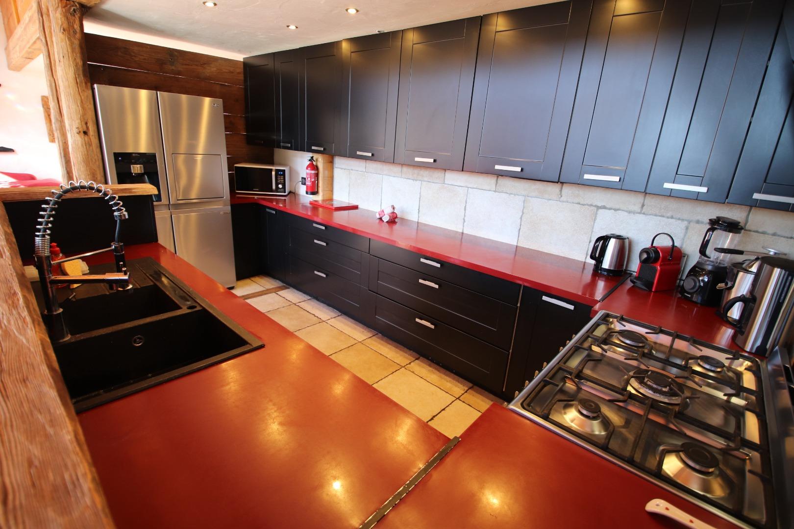 La cuisine toute équipée pour 22 personnes.